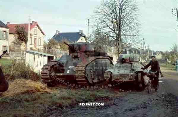 Captured Char B1 French heavy tank DROUOT with a camouflage FCM 36 Char leger Modele 1936 light infantry Tank. No.30036