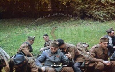 Captured French Military POW soldiers and military police men escorted back to German border. Belgium 1940