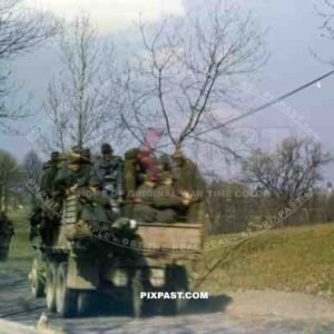 Captured German Luftwaffe POWs on American GMC Jimmy trucks near Wesel Germany on the Rhine. After Varsity. 1945