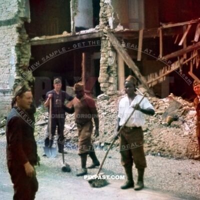 Captured POW French Colonial African troops doing forced labor. Road cleaning. Verdun France 1940