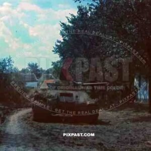 Captured Russian t34 panzer tank, Russian village, spring 1942, Tank burned out.