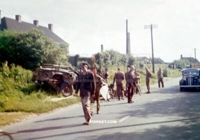 Car crash outside London England 1944. Dodge M37 Us Army truck. Soldiers joking about crash.