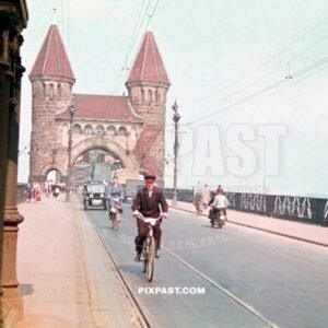Cars, pedestrians and cyclists on the old Alt Bonn Rhinebrucke Germany 1938. Bridge destroyed in 1945 on the Rhine