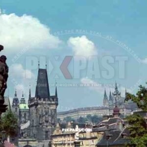 Charles Bridge crossing the Vltava river in Prague, Czech Republic 1940. Malostranska mostecka vez. Prague Castle