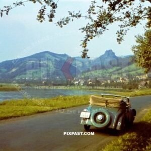 Civilian German Mercedes cabrio racing car in Green. Drive beside The Dresden Elbe Valley. Germany 1938. I-25919