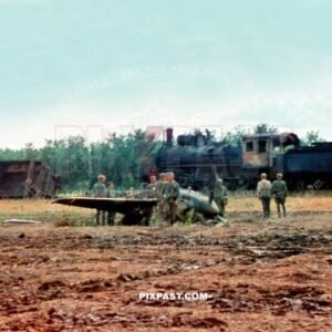 Crashed Russian fighter plane YAK 9 in front of blown up and burned Russian train. Russia 1940. 297 Infantry Division