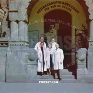 Doctors on the steps of the Bezirkshauptmannschaft Fur Den XX Bezirk Hospital. Brigittaplatz 10. Vienna Wien Austria 1941.