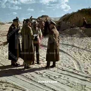 Field Marshal Erwin Rommel talks with Army Generals, Tunisian Desert 1942.