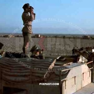 Field Marshal Erwin Rommel watching battlefield 1941 Tunisia in Captured British armoured truck MAX. MAMMUT