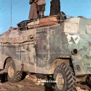 Field Marshal Erwin Rommel watching battlefield 1941 Tunisia in Captured British armoured truck MAX. MAMMUT