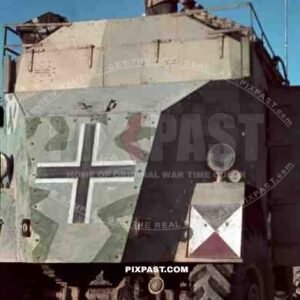 Field Marshal Erwin Rommel watching battlefield 1941 Tunisia in Captured British armoured truck MAX. MAMMUT