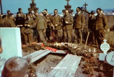 French army officers as POW Prisoners attending the French army comrade funeral.  Hoechstadt an der Aisch, Germany 1943
