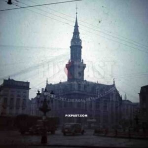 French town city hall market square German Wehrmacht truck supply column staff car clock tower 1940