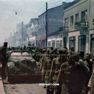 German 94. Infantry division soldiers take Russian military prisoners, Lutsk, Ukraine, 1941, Street Lesja-Ukrajinka.