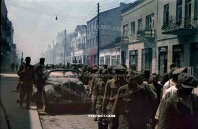 German 94. Infantry division soldiers take Russian military prisoners, Lutsk, Ukraine, 1941, Street Lesja-Ukrajinka.