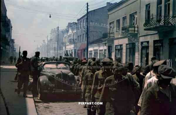 German 94. Infantry division soldiers take Russian military prisoners, Lutsk, Ukraine, 1941, Street Lesja-Ukrajinka.
