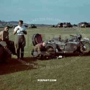 German BMW R12 MotorBike with sidecar, officers having lunch beside Panzer Park, 3rd Panzer Division. Beresina 1941.