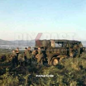 German Bussing NAG G31 Kfz.77 radio truck. Unloading portable radio sets, Sicily May 1943.