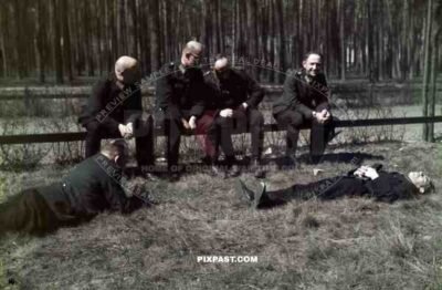 German Field Police wresting in woods after trainning day. Bremen, 1939.