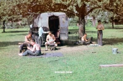 German Funker radio unit cleaning their Kar98 rifles in France 1940. 297 Infantry Division. Kfz.31 Steyr 640