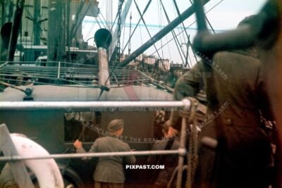 German Gebirgsjager loading radio Funker Horch army trucks onto transport ship from Danzig to Finland 1942