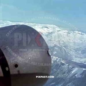 German Junkers Ju52 Transport Plane flying troops over the Caucasus Mountains. Southern Russia 1942