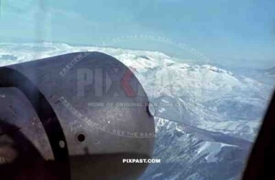 German Junkers Ju52 Transport Plane flying troops over the Caucasus Mountains. Southern Russia 1942