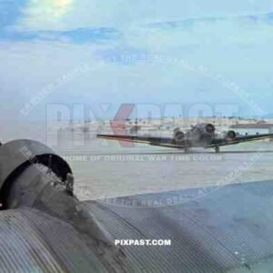 German Luftwaffe JU 52 Junkers transport plane landing in North Africa with telephone electrical supplies. 1943