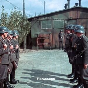 German Luftwaffe air force soldiers parade with Kar98 rifles at security station for RAD bridge repair unit. France 1940