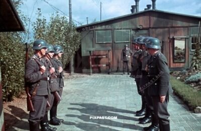 German Luftwaffe air force soldiers parade with Kar98 rifles at security station for RAD bridge repair unit. France 1940