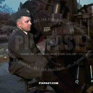 German Luftwaffe man sitting on Flak 88mm anti-aircraft gun, Bautzen, Saxony Germany 1943