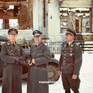 German Luftwaffe officers. Behind war reporter Kriegsberichter in Smolensk west Russia winter 1942. Uspensky  Cathedral