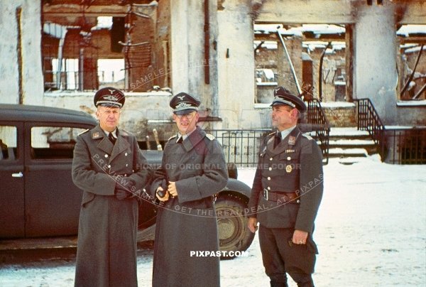 German Luftwaffe officers. Behind war reporter Kriegsberichter in Smolensk west Russia winter 1942. Uspensky Cathedral