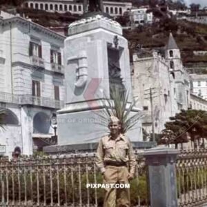 German Luftwaffe soldier in front of statue in Amalfi, Italy ~1942