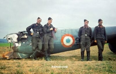 German Luftwaffe troops inspect the rear section of a  French Bloch MB-174  French Reconnaissance bomber plane. 1940