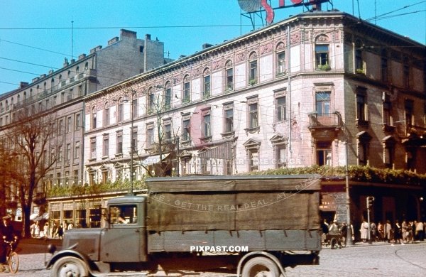 German Opel Blitz 1936 army truck with canvas cover in middle of Warsaw Poland 1939 after invasion