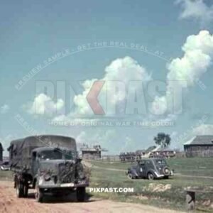 German Opel Blitz supply truck with camouflage, Redcross car with staff, Russian Village, 19th Panzer Division, Minsk 1941.