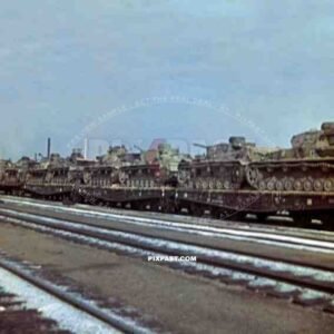 German Panzer Tank 4 in yellow sand camouflage loaded onto train wagons. towards Russian front 1943