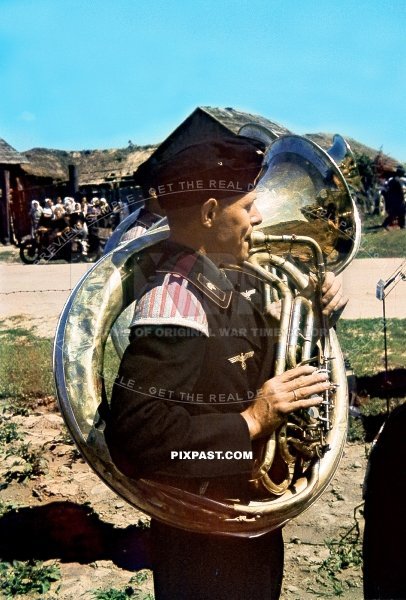 German Panzer tank Music band playing the Tuba for local Russian farmers. 3RD Panzer Division. Russia 1942