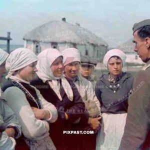 German Propaganda war reporter talking to Russian farmers. Area near Stalingrad Russia 1942.