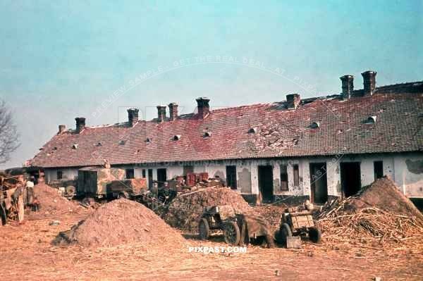 German Stug Panzer being repaired. Panzerfaust rockets in Paratrooper trolleys. Plattensee offensive. March 06 1945