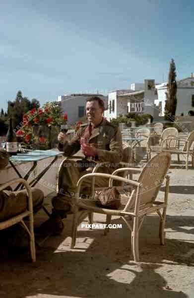 German War Photographer Fritz Moosmüller drinks wine beside Leica III Camera,  Apartment Balcony, Karthago, Tunesien 1942