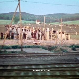 German Wehrmacht soldiers prisoner in open POW camp field outside of Berlin Germany 1945