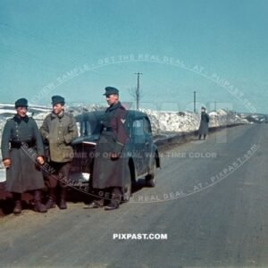 German army Jager hunting unit beside their Opel Olympia staff car in Norway 1942