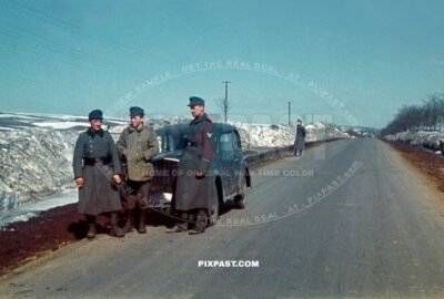 German army Jager hunting unit beside their Opel Olympia staff car in Norway 1942
