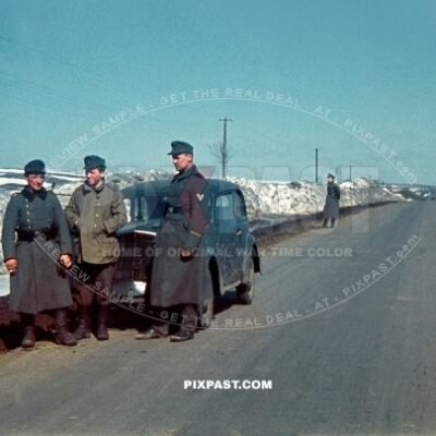 German army Jager hunting unit beside their Opel Olympia staff car in Norway 1942