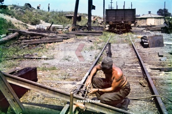 German army engineers repairing destroyed train tracks near Kharkov Ukraine 1942. 177. Division Kraftfahr Ersatz Battalion