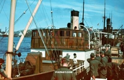 German army mountain troops Gebirgsjager boarding the Norwegian steel screw steamer BODEN. Tromso Norway 1940