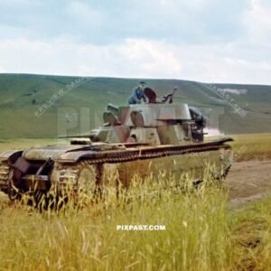 German army officer climbing on a T-35 multi-turreted heavy tank for inspection. 19th Panzer Division Russia 1941