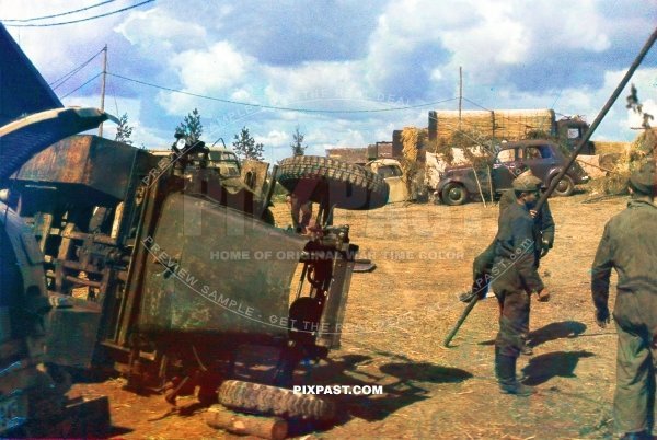 German army repair unit repairs Krupp Protze L2H43 Kfz.70 _qt_ 6x4 German truck and Raupenschlepper Ost RSO in Russia 1943
